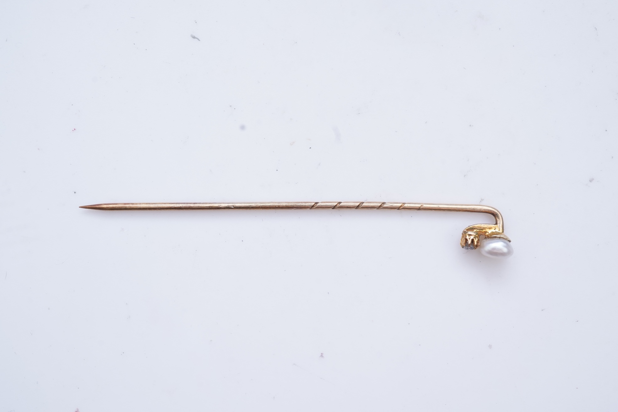 Two cameos and a stick pin, 19th century